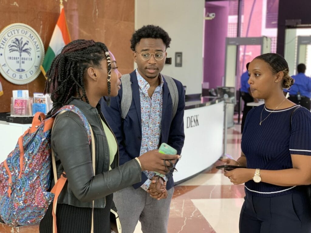 Program manager Filsan Abikar meets with Fellows at Miami City Hall