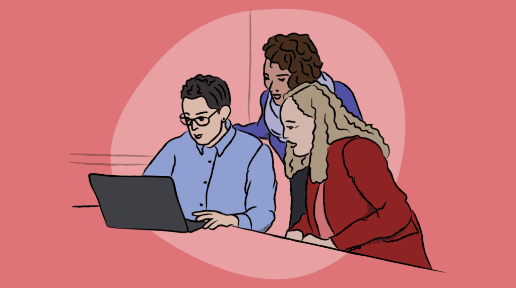 a group around a computer