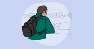 Image of person with backpack standing outside in a city